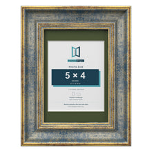 Cassis Blue 7 x 5 inch picture frame with a green mount for a 5 x 4 inch photo
