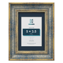 Cassis Blue 7 x 5 inch picture frame with a pacific blue mount for a 5 x 3.5 inch photo