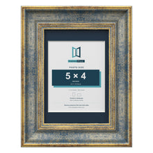 Cassis Blue 7 x 5 inch picture frame with a pacific blue mount for a 5 x 4 inch photo