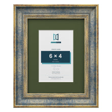 Cassis Blue 9 x 7 inch picture frame with a green mount for a 6 x 4 inch photo