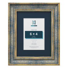 Cassis Blue 9 x 7 inch picture frame with a pacific blue mount for a 6 x 4 inch photo