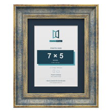 Cassis Blue 9 x 7 inch picture frame with a pacific blue mount for a 7 x 5 inch photo