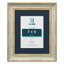 Cassis Cream 10 x 8 inch picture frame with a pacific blue mount for a 7 x 5 inch photo