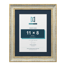 Cassis Cream 14 x 11 inch picture frame with a pacific blue mount for an 11 x 8 inch photo