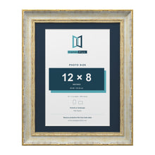 Cassis Cream 14 x 11 inch picture frame with a pacific blue mount for a 12 x 8 inch photo