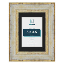 Cassis Cream 7 x 5 inch picture frame with a black mount for a 5 x 3.5 inch photo