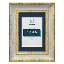 Cassis Cream 7 x 5 inch picture frame with a pacific blue mount for a 5 x 3.5 inch photo