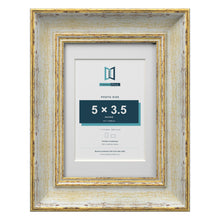 Cassis Cream 7 x 5 inch picture frame with a white mount for a 5 x 3.5 inch photo