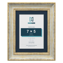 Cassis Cream 9 x 7 inch picture frame with a pacific blue mount for a 7 x 5 inch photo