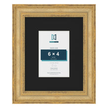 Cassis Gold 10 x 8 inch picture frame with a black mount for a 6 x 4 inch photo