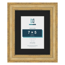 Cassis Gold 10 x 8 inch picture frame with a black mount for a 7 x 5 inch photo