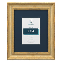 Cassis Gold 10 x 8 inch picture frame with a pacific blue mount for a 6 x 4 inch photo