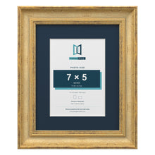 Cassis Gold 10 x 8 inch picture frame with a pacific blue mount for a 7 x 5 inch photo