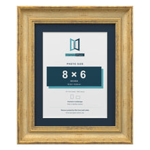 Cassis Gold 10 x 8 inch picture frame with a pacific blue mount for an 8 x 6 inch photo
