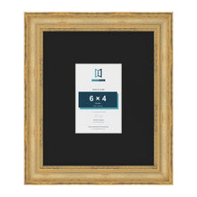 Cassis Gold 12 x 10 inch picture frame with a black mount for a 6 x 4 inch photo