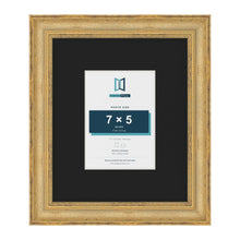 Cassis Gold 12 x 10 inch picture frame with a black mount for a 7 x 5 inch photo