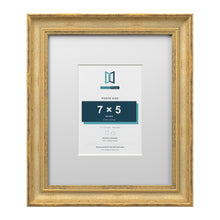 Cassis Gold 12 x 10 inch picture frame with a white mount for a 7 x 5 inch photo