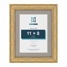 Cassis Gold 14 x 11 inch picture frame with a dawn grey mount for an 11 x 8 inch photo