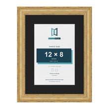 Cassis Gold 16 x 12 inch picture frame with a black mount for a 12 x 8 inch photo