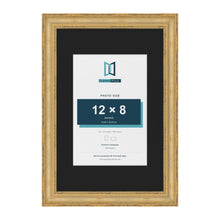 Cassis Gold 18 x 12 inch picture frame with a black mount for a 12 x 8 inch photo