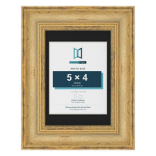 Cassis Gold 7 x 5 inch picture frame with a black mount for a 5 x 4 inch photo