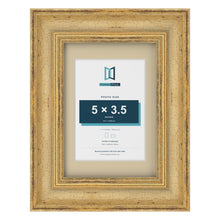 Cassis Gold 7 x 5 inch picture frame with an ivory mount for a 5 x 3.5 inch photo