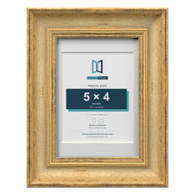 Cassis Gold 7 x 5 inch picture frame with a white mount for a 5 x 4 inch photo