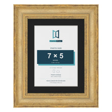 Cassis Gold 9 x 7 inch picture frame with a black mount for a 7 x 5 inch photo