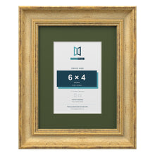 Cassis Gold 9 x 7 inch picture frame with a green mount for a 6 x 4 inch photo