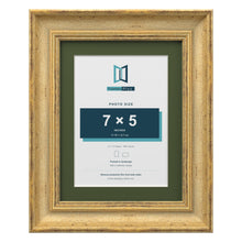 Cassis Gold 9 x 7 inch picture frame with a green mount for a 7 x 5 inch photo
