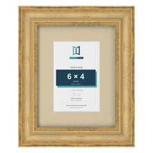Cassis Gold 9 x 7 inch picture frame with an ivory mount for a 6 x 4 inch photo