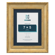 Cassis Gold 9 x 7 inch picture frame with a pacific blue mount for a 7 x 5 inch photo
