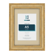 Cassis Gold A4 picture frame with an ivory mount for an A5 photo