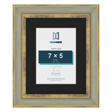Cassis Green 10 x 8 inch picture frame with a black mount for a 7 x 5 inch photo