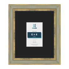 Cassis Green 12 x 10 inch picture frame with a black mount for a 6 x 4 inch photo