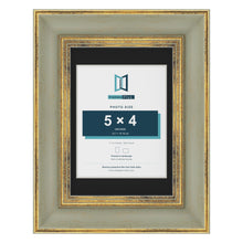 Cassis Green 7 x 5 inch picture frame with a black mount for a 5 x 4 inch photo