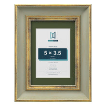 Cassis Green 7 x 5 inch picture frame with a green mount for a 5 x 3.5 inch photo
