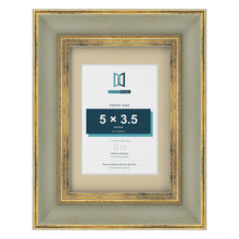 Cassis Green 7 x 5 inch picture frame with an ivory mount for a 5 x 3.5 inch photo