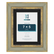 Cassis Green 9 x 7 inch picture frame with a black mount for a 7 x 5 inch photo