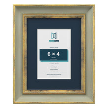 Cassis Green 9 x 7 inch picture frame with a pacific blue mount for a 6 x 4 inch photo