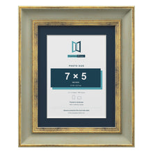 Cassis Green 9 x 7 inch picture frame with a pacific blue mount for a 7 x 5 inch photo