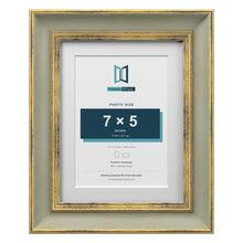 Cassis Green 9 x 7 inch picture frame with a white mount for a 7 x 5 inch photo
