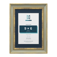Cassis Green A4 picture frame with a pacific blue mount for a 9 x 6 inch photo