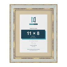 Cassis Light Grey 14 x 11 inch picture frame with an ivory mount for an 11 x 8 inch photo