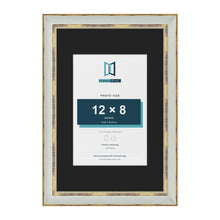 Cassis Light Grey 18 x 12 inch picture frame with a black mount for a 12 x 8 inch photo