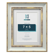Cassis Light Grey 9 x 7 inch picture frame with a white mount for a 7 x 5 inch photo