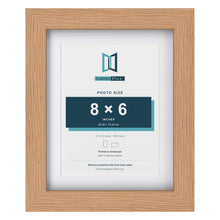 Classic Oak 10 x 8 inch picture frame with a white mount for an 8 x 6 inch photo