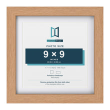 Classic Oak 11 x 11 inch picture frame with a white mount for a 9 x 9 inch photo