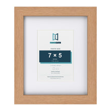 Classic Oak 11 x 9 inch picture frame with a white mount for a 7 x 5 inch photo