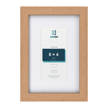 Classic Oak 12 x 8 inch picture frame with a white mount for an 8 x 4 inch photo
